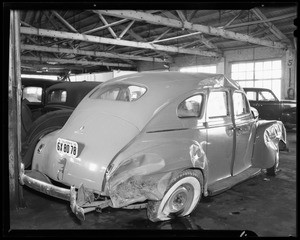 Damaged 1940 Plymouth sedan, owner Barrett, Los Angeles, CA, 1940