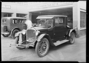 Dodge car at white garage on Cahuenga Boulevard, Los Angeles, CA, 1930