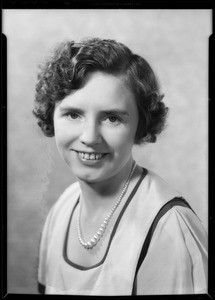 Portrait of Mrs. M.G. Arnold, 9th winner of new Ford V8, Southern California, 1934