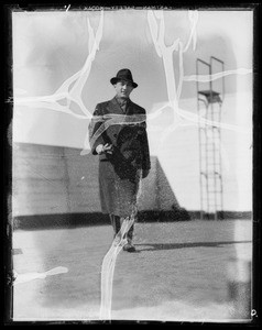 Man in overcoat, Southern California, 1935