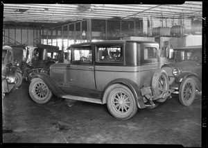 Wrecked Oakland and motorcycle at Slaten Garage - for Sawtelle police station, Southern California, 1929