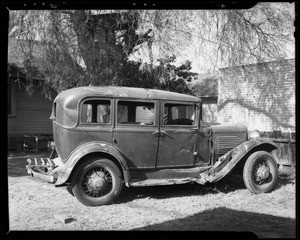 Damage to 1930 Willys sedan, 242 West 85th Place, Los Angeles, CA, 1940