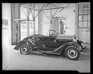 Bernstein Ford roadster and other party Oldsmobile convertible coupe, Southern California, 1940