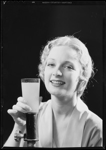 Estelle Etteve & orange juice, Southern California, 1932