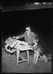 Mr. White & dog at General Electric ironer, Southern California, 1935