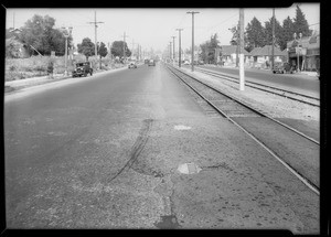 Skid marks on Colorado Street in Eagle Rock in front of Hart Motor Company, Los Angeles, CA, 1935