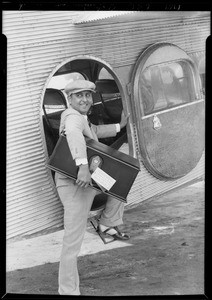 Traveling with radio in Maddux plane, Southern California, 1929