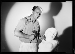 Sculptor and copies, Southern California, 1934