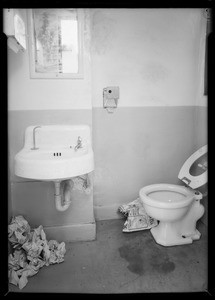 Dirty toilet in service station, Southern California, 1935