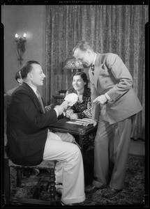 Mr. Doumini playing bridge, Ford winner, Southern California, 1934