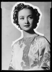 Photo of hair curler & copies of ladies heads, Southern California, 1936