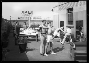 Men on roof, Roosevelt Building, 727 West 7th Street, Los Angeles, CA, 1931