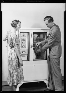 Copeland box with Mr. Thomas and girl, Southern California, 1931