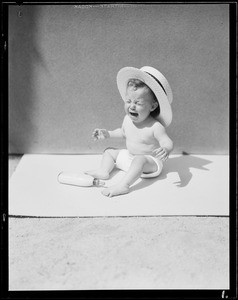 Baby under straw hat, Retail Hatters' Association, Southern California, 1931