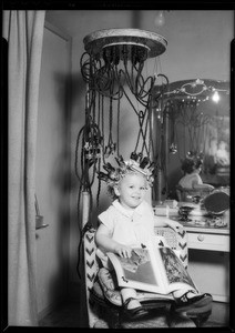 Child getting permanent wave, Southern California, 1933