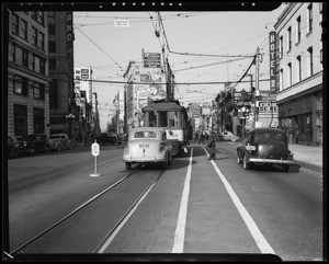 Safety zone and skid marks at West 9th Street and South Main Street, Los Angeles, CA, 1940