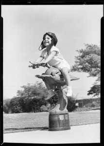 Sheila Brown & trophies, age 4 years, 1000 hours in air, Southern California, 1933