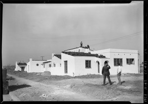 Mr. Shaw inspecting pavement, Southern California, 1927