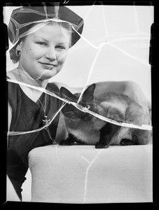 Miss Thayer and Siamese cat, Southern California, 1935