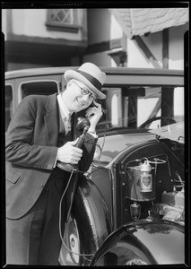 Telephone attached to motor on car, Southern California, 1929