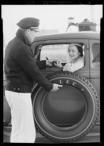 Salesman with Lee tire at 2223 West Florence Avenue, Los Angeles, CA, 1934