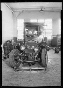 Wrecked White truck belonging to Bullock's, Southern California, 1931