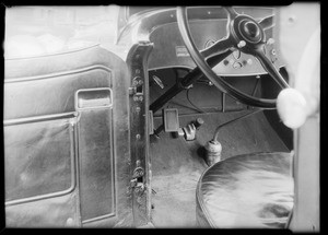 Hoot Gibson car showing compartment and brake pedals, Southern California, 1932