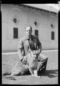 Mr. Stevens & lion, Southern California, 1935