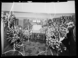 Flowers and casket at 3927 Brighton Avenue, Los Angeles, CA, 1935