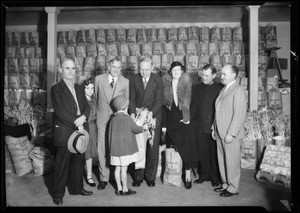 Distributing Christmas bags of food, Southern California, 1931