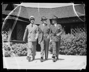 Action in suits and overcoats, Southern California, 1935