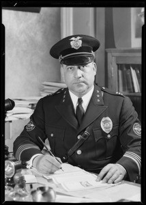 Police Chief Davis and girl, Southern California, 1931