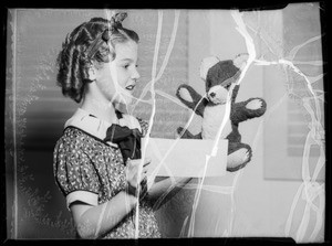 Little girl receiving $500 check, Southern California, 1936