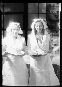 Serving cake for church social, Southern California, 1931