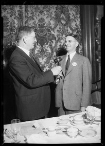 Mr. Scholts receiving gavel from retiring president, Southern California, 1934