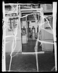 Step from station room to battery room in Associated Station at West 20th Street & South Vermont Avenue, Los Angeles, CA, 1940