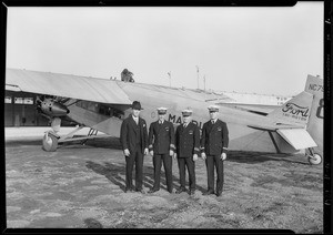 Group of Tomlinson, Preeg, Chief Engineer, and Chief Mate J. H. Black, Southern California, 1929