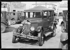 Wrecked Oldsmobile sedan taken at East Florence Avenue & South Avalon Boulevard, Los Angeles, CA, 1933