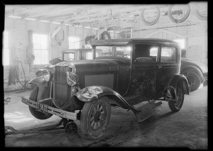 Oldsmobile and Ford roadster, Southern California, 1931