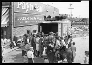 Refrigerator truck and children, opening of store, Southern California, 1932