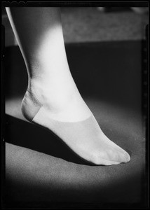 Foot in hose with double strength reinforcement, Southern California, 1935