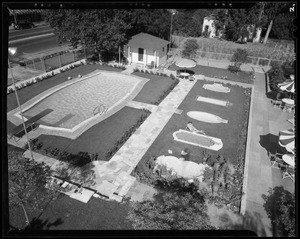 Model pool on Ventura Boulevard at Sepulveda Boulevard with girl, Los Angeles, CA, 1940