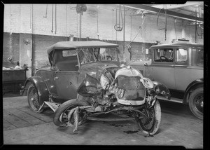 Wrecked Ford roadster, 1W4489, owner Richard Moyer, at Master Service Garage, 811 Whittier, Southern California, 1931