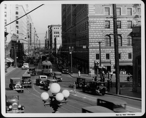 Looking along Seventh Street from the Figueroa Street intersection as many cars crowd the streets