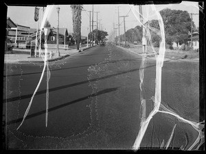 Intersection and skid marks at South Normandie Avenue and Exposition Boulevard, Los Angeles, CA, 1935