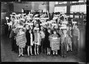 School children opening new accounts, First National Bank, 4647 Whittier Boulevard, East Los Angeles, CA, 1930