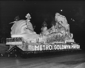 Shriner's night time parade at Coliseum, featuring Metro Goldwyn Mayer float