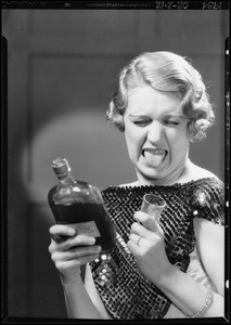 Volta Boyer with bottle of liquor, Southern California, 1934