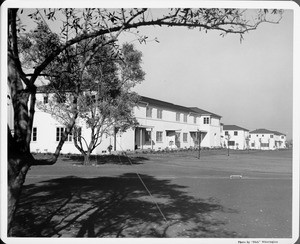 Wyvernwood Housing complex with 2-story units divided by greenbelt and walkways