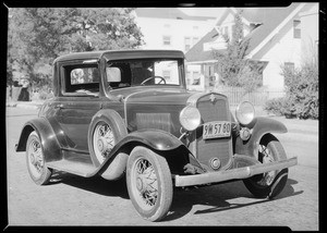 Damaged Chevrolet coupe, Mr. Koch assured, and intersection of Riverside Drive and Los Feliz Boulevard, Southern California, 1932